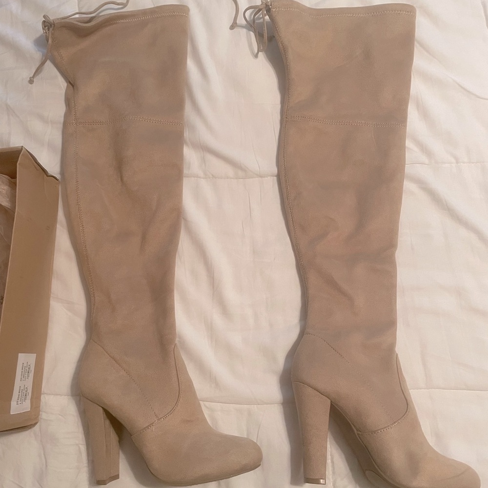 Over the knee heeled boots